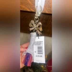 Brahmin Gold and Purple Tassel Keychain